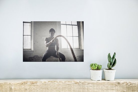 Affiche - Une femme s'entraine avec deux cordes - 30x20 cm