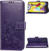 Mobigear Telefoonhoesje geschikt voor Samsung Galaxy M31 Hoesje | Mobigear Clover Bookcase Portemonnee | Pasjeshouder voor 3 Pasjes | Telefoonhoesje voor Pinpas / OV Kaart / Rijbewijs - Paars