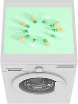 Wasmachine beschermer mat - Flesjes op een mintgroene achtergrond - Breedte 55 cm x hoogte 45 cm