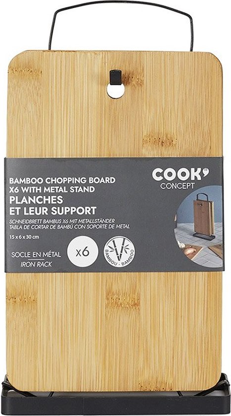 Planche à découper en bambou dans un emballage avec support métallique et texte : 'COOK CONCEPT BAMBOO CHOPPING BOARD X6 WITH METAL STAND'.