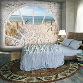 Fotobehangkoning - Behang - Vliesbehang - Fotobehang Uitzicht op het Strand vanuit het Raam 3D - Window View - Beach - 350 x 245 cm