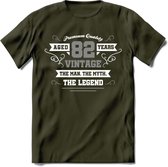 82 Jaar Legend T-Shirt | Zilver - Wit | Grappig Verjaardag en Feest Cadeau | Dames - Heren - Unisex | Kleding Kado | - Leger Groen - L