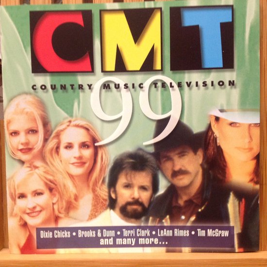 CD-hoes met het logo "CMT COUNTRY MUSIC TELEVISION 99". Bovenste rij: blonde vrouw, brunette man. Onderste rij: blonde vrouw, blonde vrouw, man met hoed, vrouw.
