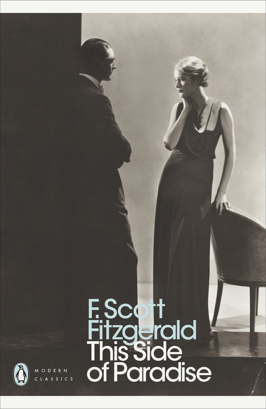Vrouw in lange jurk leunt op stoel, kijkt naar man in pak. Titel: This Side of Paradise.