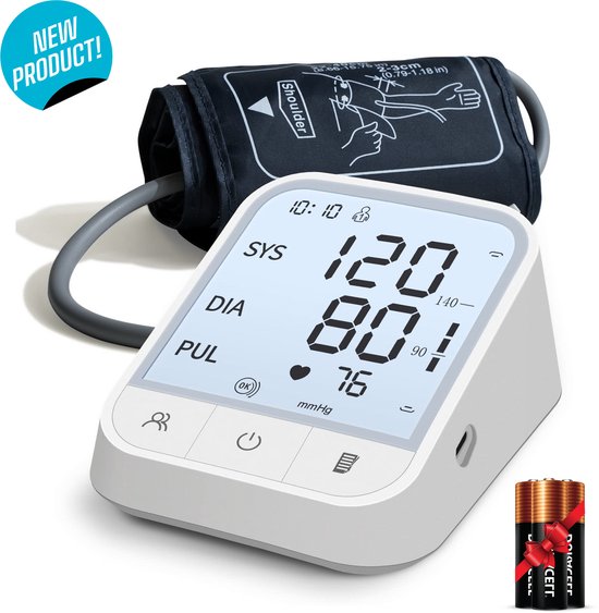 Wit-grijze bloeddrukmeter met zwart manchet, display toont 120/80 mmHg en 76 BPM. Naast de meter liggen twee batterijen. Product is nieuw.