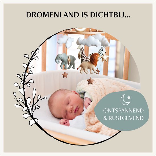Bébé endormi dans un berceau avec un mobile bébé montrant des animaux, des nuages et une lune. Relaxant et apaisant.