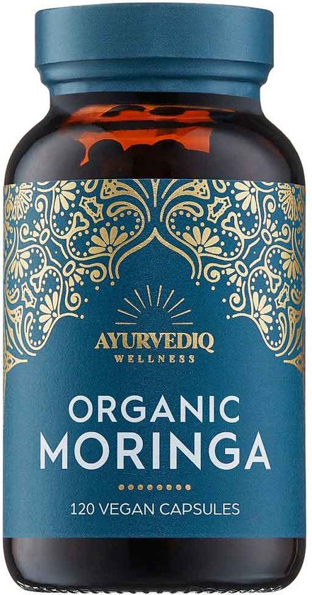 Een bruine fles Ayurvediq biologische moringa capsules met een blauw en goudkleurig etiket.