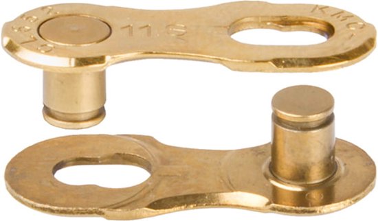 Twee gouden KMC 11-speed MissingLink schakels, close-up.