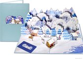 Cartes pop-up Popcards - Belle carte de Noël imposante avec paysage enneigé, montagnes, jolies maisons, rennes et bonhomme de neige. Carte pop-up de Noël 3D.