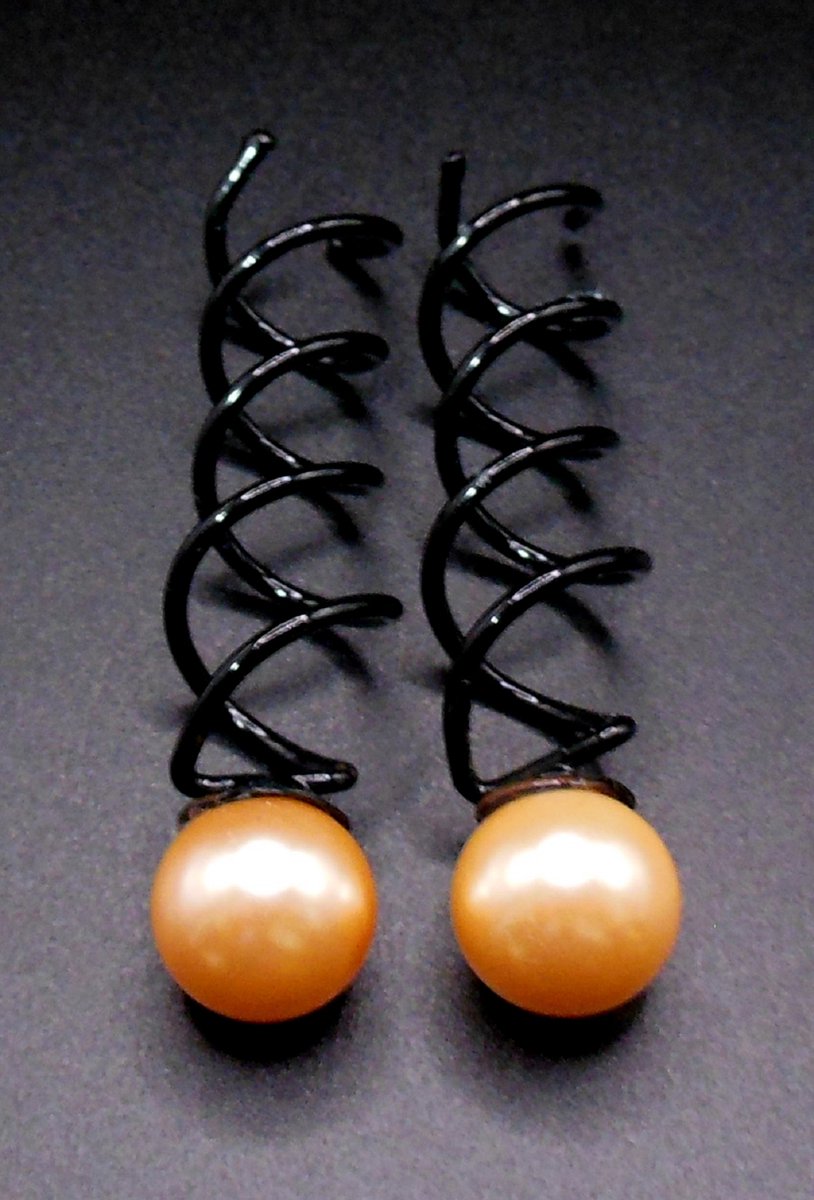 Haarspiralen zwart met parel oranje