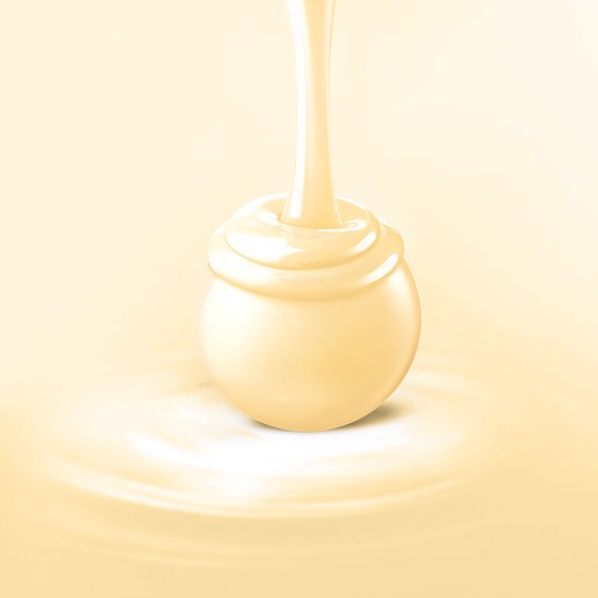 Gesmolten witte chocolade wordt over een Lindt LINDOR chocoladebal gegoten, met wervelende effecten.