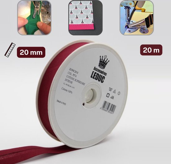 Een rol bordeauxrode biasband van 20 meter, van 100% katoen, op een kartonnen spoel.