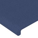 Gros plan de la texture du tissu bleu sur une tête de lit.