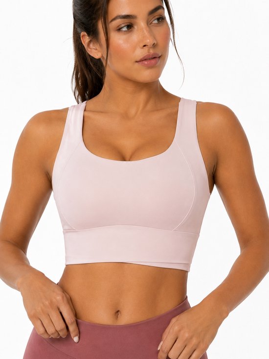 SparkNine Flexaura sport BH - stijlvolle sportbeha - ingebouwde pads - S - roze - high support ondersteuning - cross design