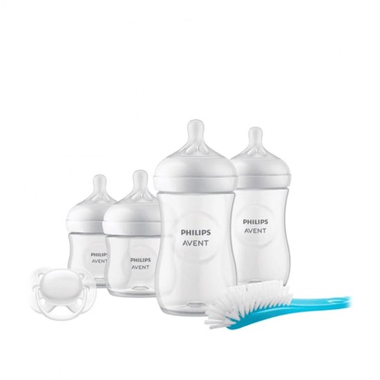 Set van vier witte Philips Avent babyflessen, een witte fopspeen en een blauwe flessenborstel.