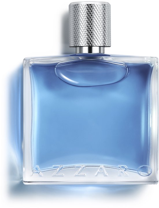 Een rechthoekige glazen flacon met een zilveren dop, gevuld met helder blauwe vloeistof.