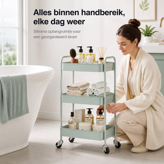 Chariot de cuisine vert menthe avec articles de toilette, rempli par une femme en robe de chambre dans une salle de bain.