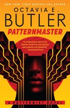 Boekomslag van "Patternmaster" door Octavia E. Butler met een silhouet van een gezicht tegen een geometrisch, rood en geel patroon.