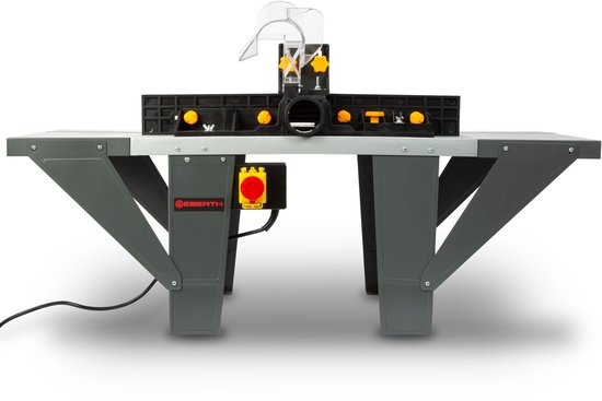 Grijze bovenfreestafel met zwarte machinebehuizing, transparante afzuigkap en gele hendel met rode noodstopknop.