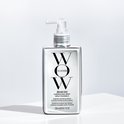 Glazen fles met WOW Dream Coat Supernatural Spray. De fles is doorzichtig met zwarte tekst.