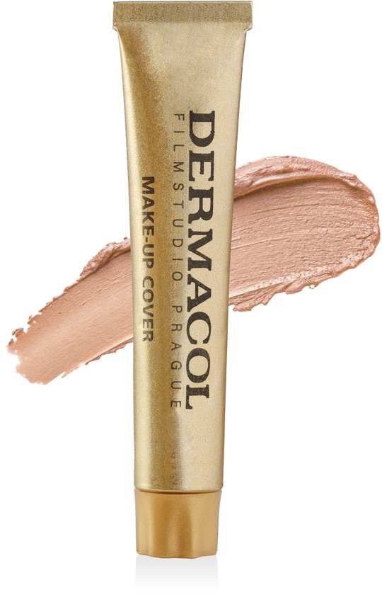 Gouden Dermacol Make-Up Cover tube met een veeg beige foundation ernaast.