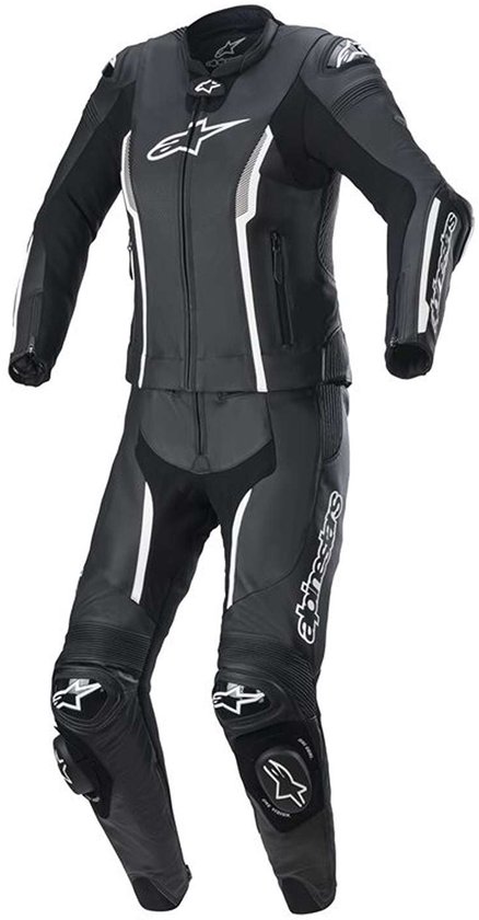 Combinaison moto Alpinestars noire avec accents blancs et logos sur la veste et le pantalon.