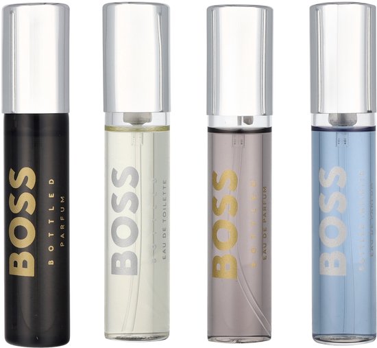 Vier BOSS Bottled mini-parfumflesjes: zwart, lichtgrijs, lichtblauw en crème, met zilveren dopjes.