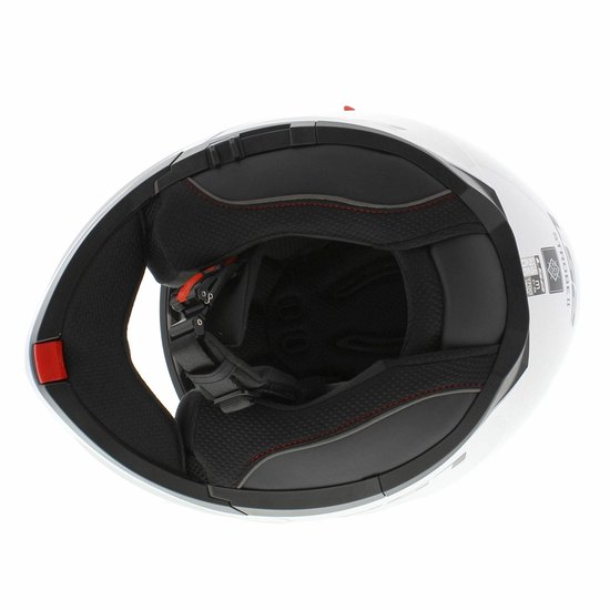 Intérieur du casque modulable blanc LS2. Doublure noire avec coutures rouges et jugulaire.