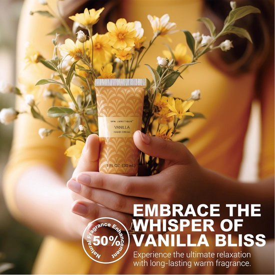 Een hand houdt een kleine tube handcrème met 'Spa Luxetique Vanilla Hand Cream' vast, omringd door gele bloemen.