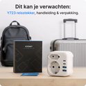 Voomy reisstekker met doos, rugzak en koffer. Bevat 2 stopcontacten en 3 USB-poorten.