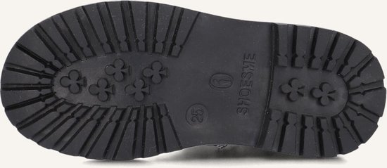 Zwarte profielzool van een laarsje met Shoesme-logo en klavertjesvier-motief.