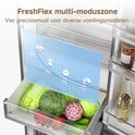 Lade in de koelkast met diverse groenten, zoals sla, broccoli en rode kool. Een grafiek toont temperatuurzones.