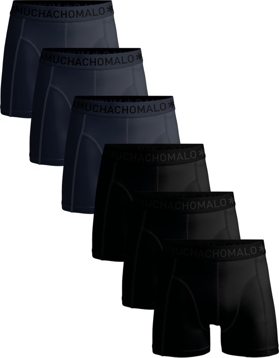 Vijf zwarte en donkerblauwe Muchachomalo boxershorts op een rij.