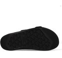 Onderkant van een zwarte Reef slipper met driehoekig profiel.