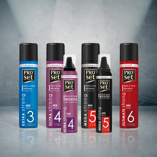 Vijf Pro Set haarspray bussen: blauw 'Extra Strong 3', paars 'Ultra Strong 4', paars mousse 'Ultra Strong 4', zwart 'Mega Strong 5', rood 'Ultimate Strong 6'.