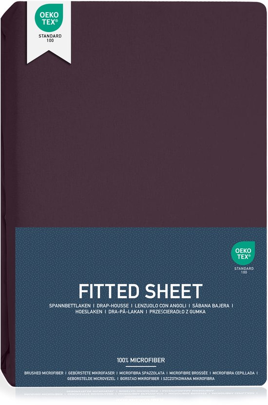 Drap-housse violet foncé en microfibre brossée avec label Oeko-Tex.