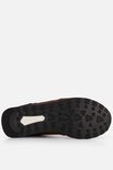 Onderkant van bruine leren Rieker sneaker, met profiel van de zool.