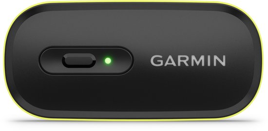 Zwarte Garmin hartslagmodule met limegroene rand en een groen lampje.