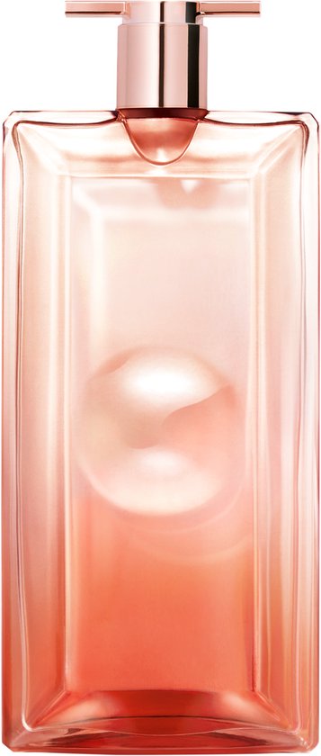 Glazen flacon van Lancôme Idôle Now Eau de Parfum met een roze, oranje en gouden gloed, met een rosé gouden dop.