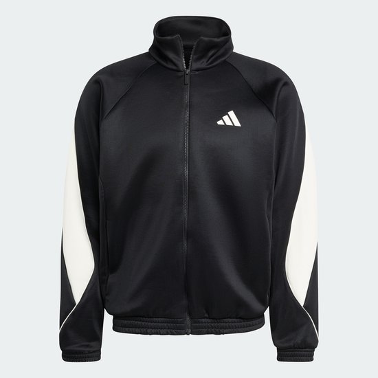 Zwarte jas met beige mouwen en een wit adidas logo op de borst. Jas met hoge kraag en ritssluiting.