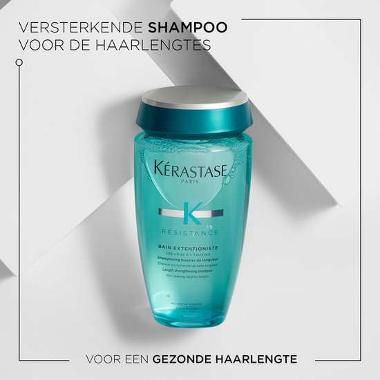 Kérastase shampoo dans une bouteille bleu sarcelle avec un bouchon bleu foncé.