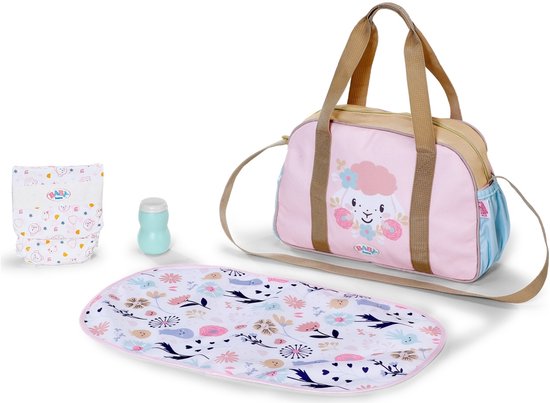 BABY born luiertas set met roze tas, bloemrijk aankleedkussen, luier en flesje op witte achtergrond.