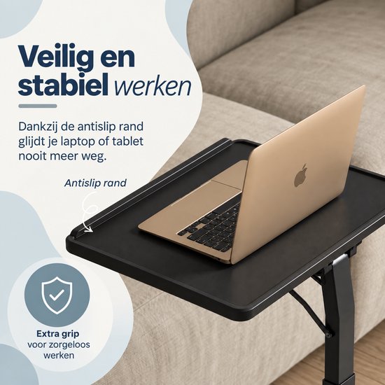 Zwart laptoptafelblad met opstaande antisliprand voor veilige plaatsing van een laptop.