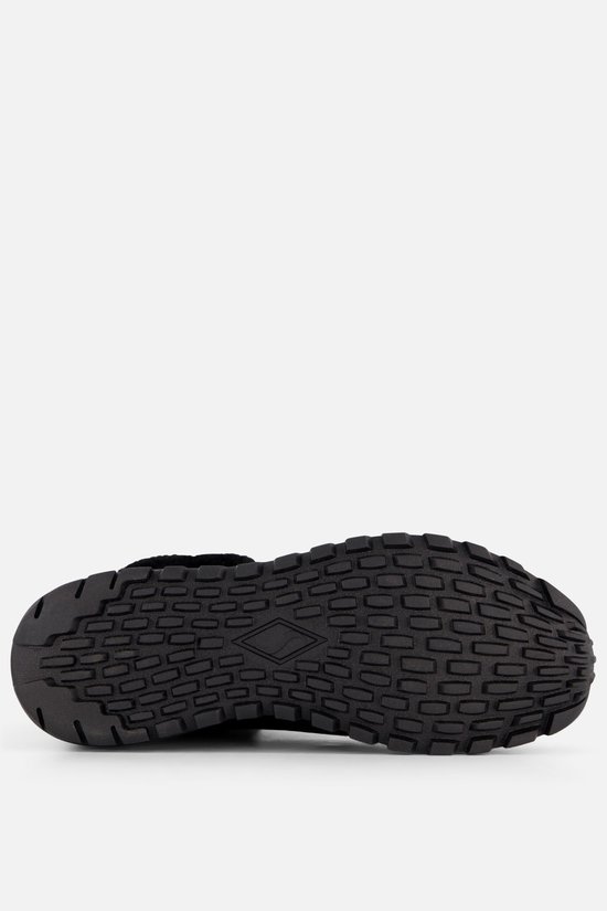 Onderaanzicht van de zwarte Skechers Uno Rugged laars met robuuste profielzool.