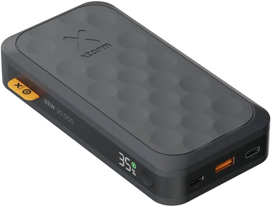 Zwarte Xtorm powerbank 20.000mAh, 35W, met cirkelpatroon en oranje details.