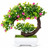 Kunstmatige bonsai met roze bloemen en groene bladeren in een witte, rechthoekige pot, geïsoleerd op wit.