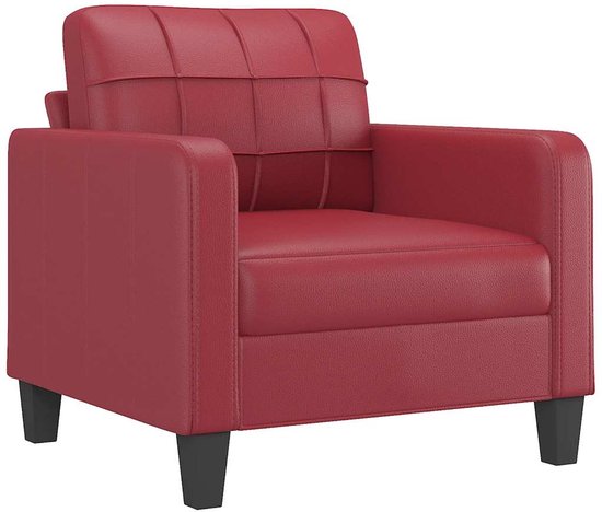 Een rode fauteuil met vierkante stiksels op de rugleuning, een strakke zitting en vierkante zwarte poten.