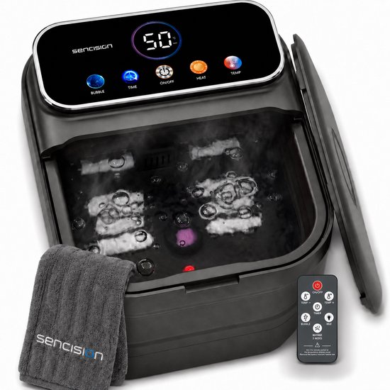Zwart Sencision voetenbad met digitale display met "50°C", bubbels, timer en afstandsbediening. Een grijze handdoek ligt naast het bad.
