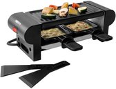 Zwarte Boska raclette voor twee personen met grillplaat voor groenten en pannetjes met gesmolten kaas.