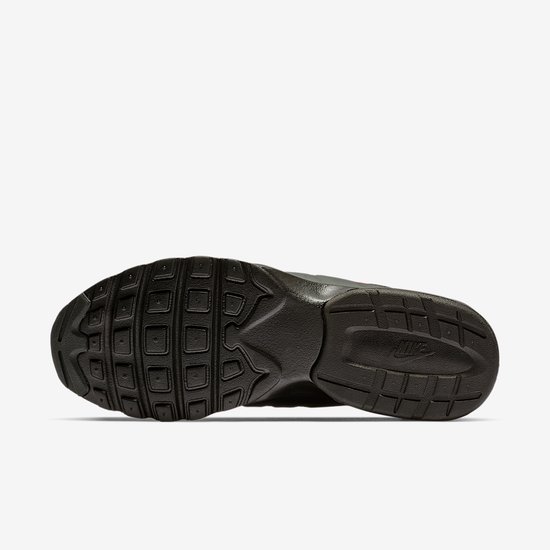 Onderkant van zwarte Nike sneakerzool met profiel en Nike logo in het midden.
